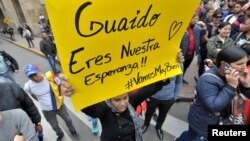 Seguidores de Guaidó durante una manifestación de apoyo en Bogotá, durante la reunión del Grupo de Lima. 