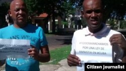 Reporta Cuba. Activistas llevando sus proclamas a favor de la libertad y de una ley de amnistía para los presos políticos y de conciencia.