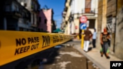Una calle cerrada por coronavirus en La Habana. (YAMIL LAGE / AFP)