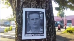 Un afiche con la imagen de José Daniel Ferrer en una calle de Santiago de Cuba pide su libertad y la de todos los presos políticos. (UNPACU)