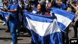 Opositores a Ortega durante una manifestación en Managua.