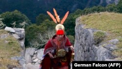 Traslado de la llama de los Juegos Panamericanos, en Machu Picchu, Perú, 4 de julio de 2019.