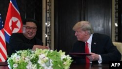 Kim Jong Un y Donlad Trump.
