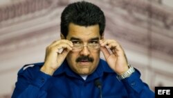 Maduro acusa a sus rivales de ser apoyados por especuladores y financistas en Estados Unidos que están conspirando para derrocar a su gobierno.