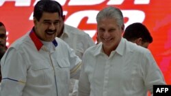 Nicolás Maduro y Miguel Díaz-Canel. (YAMIL LAGE / AFP)