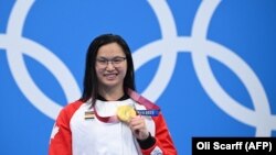 Margaret Macneil, campeona del mundo de Canadá en 100 metros mariposa. (Oli Scarff / AFP).