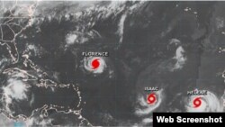 El huracán Florence, y las tormentas tropicales Isaac y Helene en una imagen del satélite. (NHC)