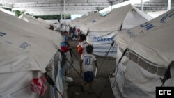 Niños juegan en el refugio de inmigrantes venezolanos Nova Canaa 8, en Boa Vista, Roraima (Brasil).