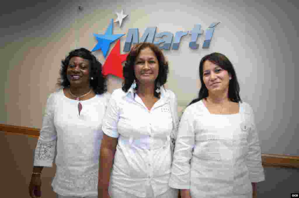 Ladies in White Berta Soler, Belkis Cantillo and Laura Maria Labrada stand in front of the Martí sign during their visit to OCB