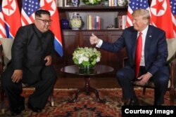 Donald Trump y Kim Jong-Un en el Hotel Capella