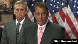 El presidente de la Cámara de Representantes, John Boehner (c).