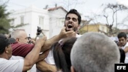 El Sexto en una marcha en La Habana junto a las Damas de Blanco el 20 de marzo de 2016.