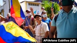 Simpatizantes del dirigente opositor Freddy Superlano participan en una manifestación en Barinas, Venezuela, el 4 de diciembre de 2021. ​Foto: AP/Ariana Cubillos.