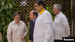 De izquierda a derecha, el canciller cubano Bruno Rodríguez, Daniel Ortega, Nicolás Maduro y Miguel Díaz-Canel. (Foto: Ramon Espinosa/Pool via REUTERS/Archivo)